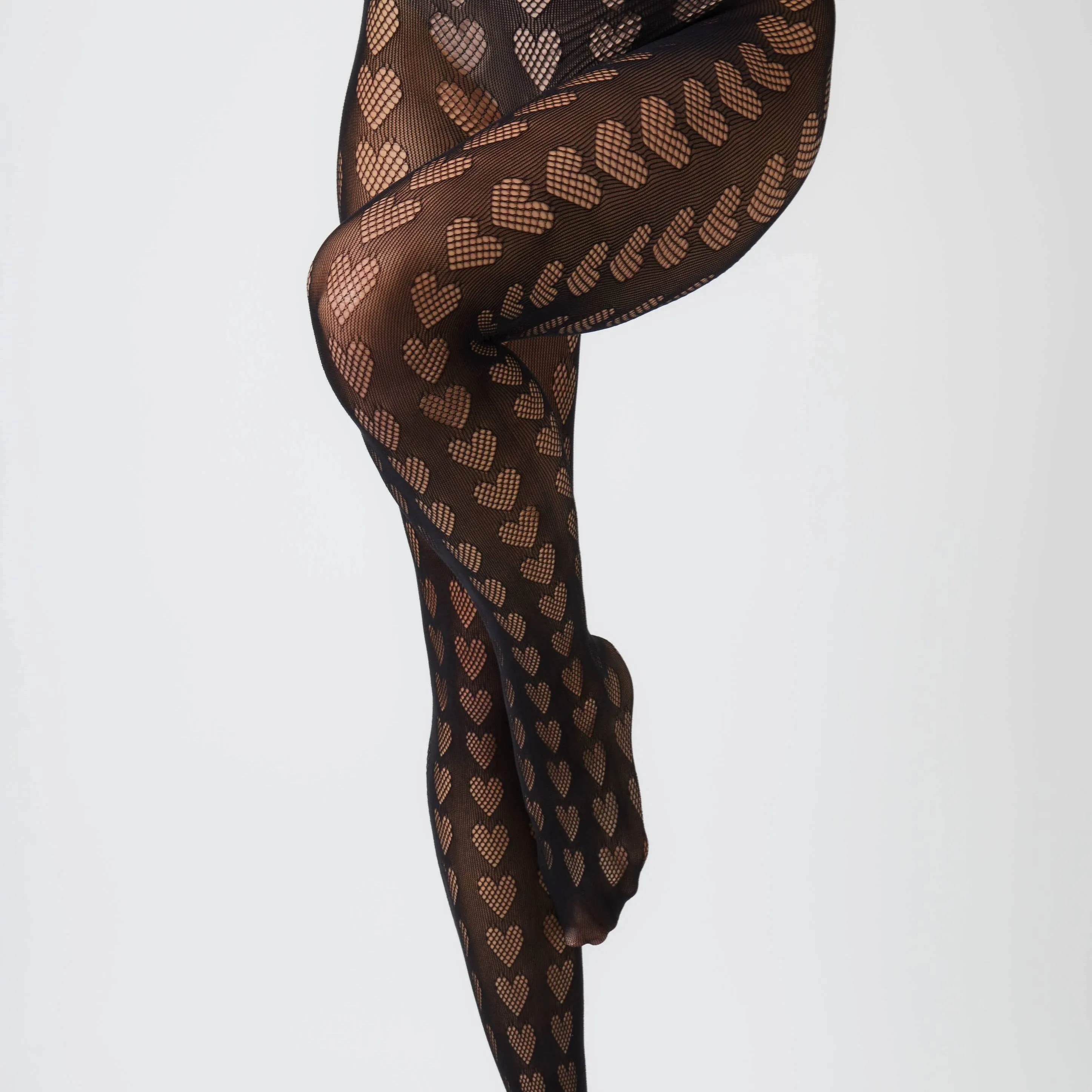 Heart Cut-Out Tights in Ebony - Fun and Fancy Legwear for Any Occasion!