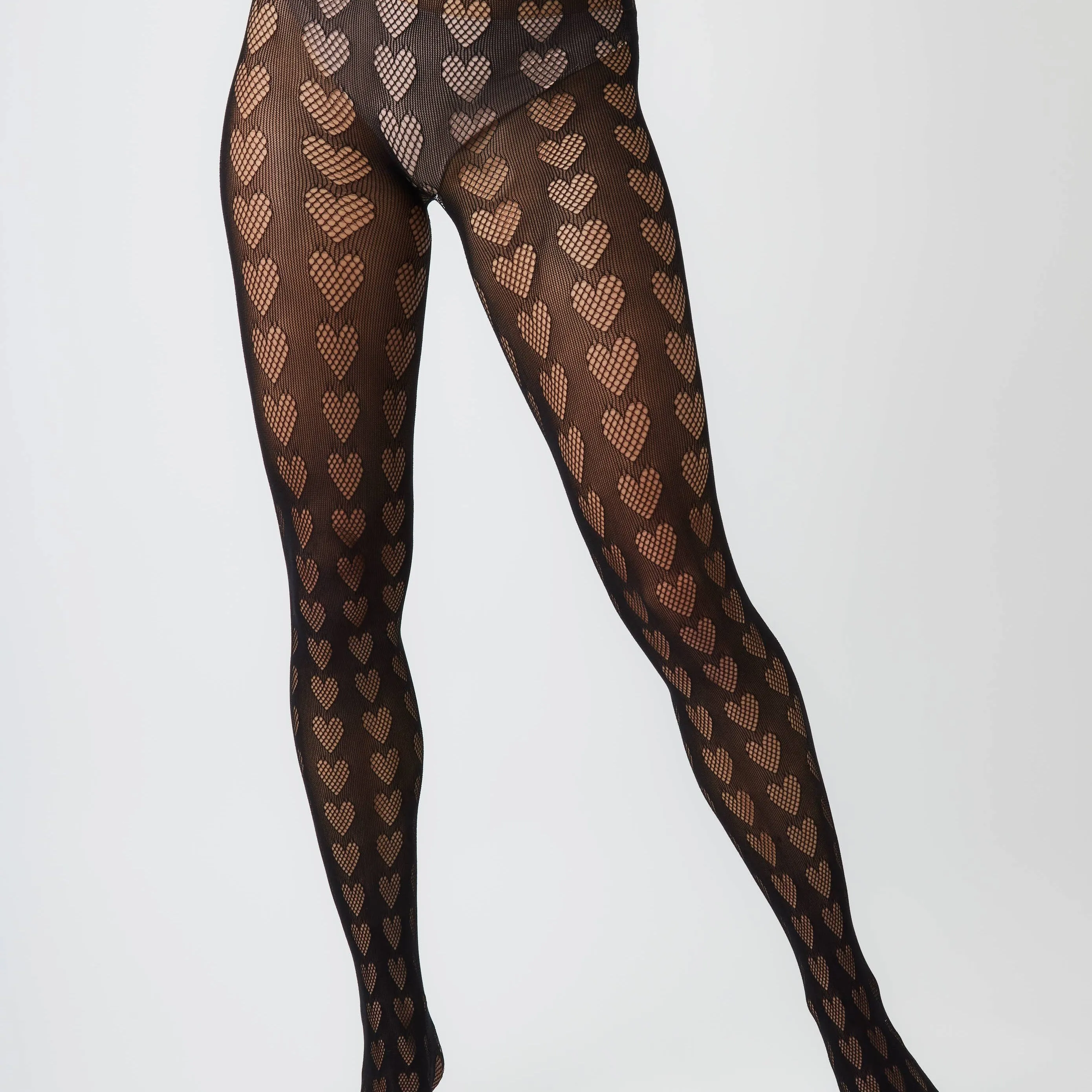 Heart Cut-Out Tights in Ebony - Fun and Fancy Legwear for Any Occasion!